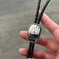 White Buffalo Bolo Tie in Black