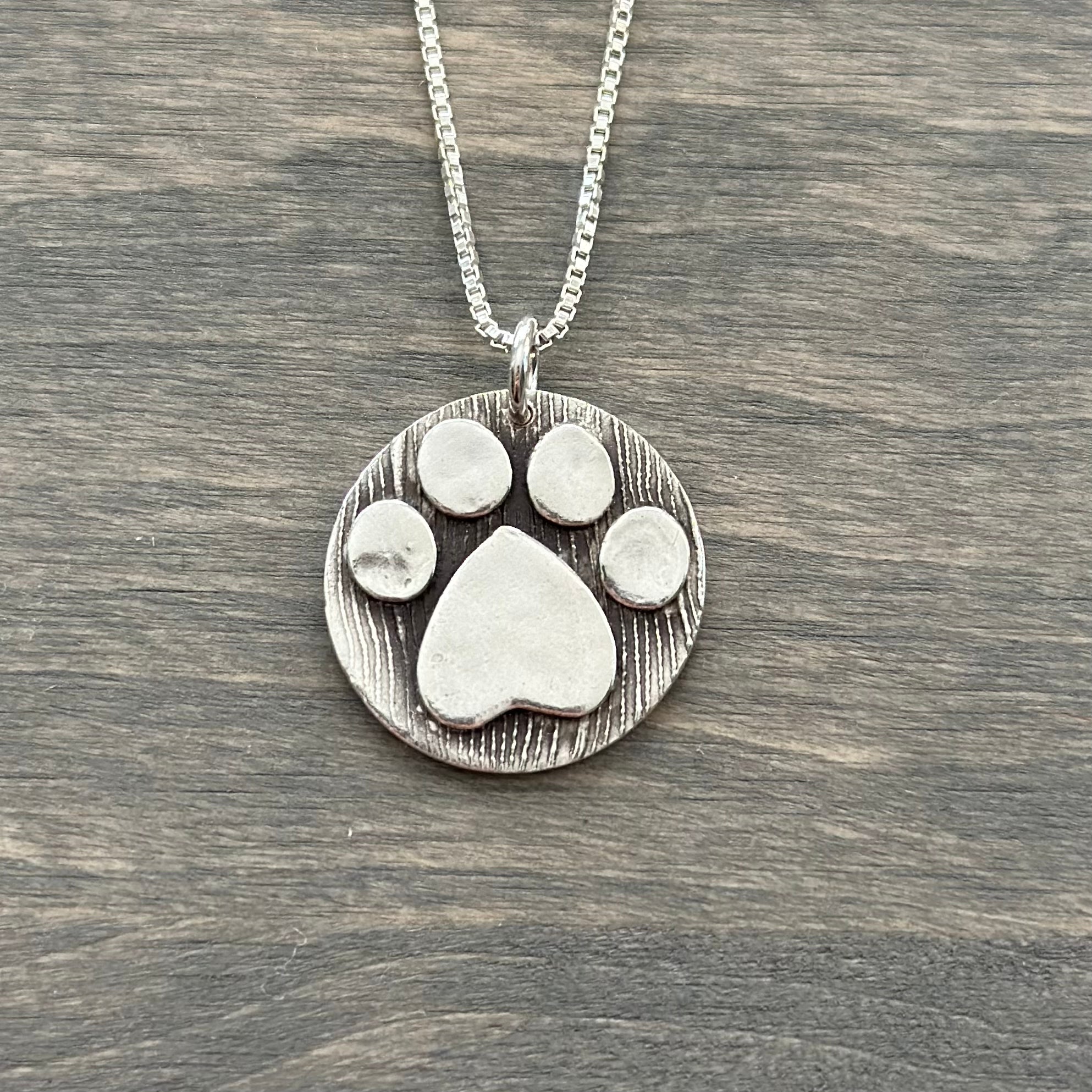 Sterling silver paw print necklace, custom made by Ron Emanuel -  thegoldsmith