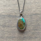 Rising Phoenix Turquoise Green Pendant